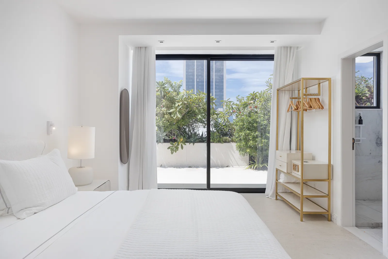 Bedroom with fitted wood wardrobe