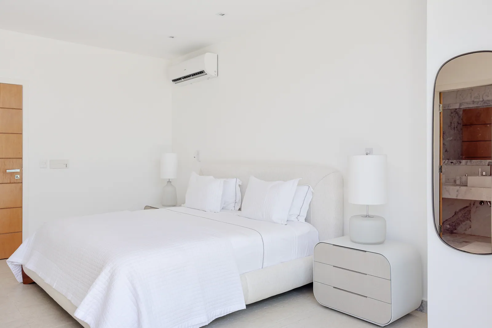 Bedroom opening onto the terrace, open clothes rack